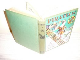 Pirates in Oz. 1st edition with 12 color plates in 1st edition (c.1931). Sold 1/28/2014 - $230.0000