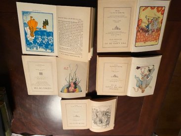 Complete set of 14 Frank Baum Oz books with color plates. Each books is 85+years  or older