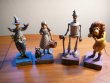 Set of 4 figurines with stand