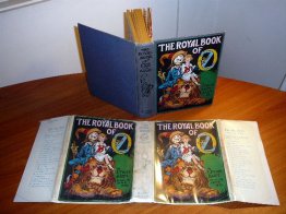 Royal book of Oz. 1928 printing, 12 color plates in dust jacket (c.1921). sold 4/7/15 - $600.0000