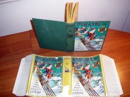 Pirates in Oz. 1st edition with 12 color plates in 1st edition dust jacket (c.1931) - $975.0000