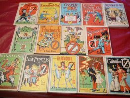 Complete set of 14 Frank Baum Oz books. White cover edition. Printed circa 1965. Sold 8/10/2016 - $600.0000