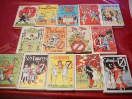 Complete set of 14 Frank Baum Oz books. White cover edition. Printed circa 1965. sold 12/4/15 - $575.0000
