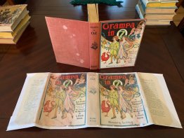 Grampa in Oz. First edition with 12 color plates  in an original 1st edition dust jacket (c.1924) by R. Thomposon