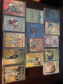 Complete set of 14 Frank Baum Oz books with color plates. Each books is 85+years old.