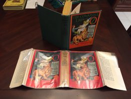 Cowardly Lion of Oz. 1st edition, 1st state with 12 color plates  in later dust jacket. (c.1923)