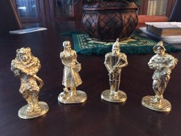 The metropolitan Guild 1989 Wizard of Oz figurines layered in 24K gold 