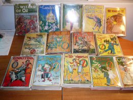 Complete set of 14 Frank Baum Oz books in dust jackets. post1935 printing. Sold. - $1800.0000