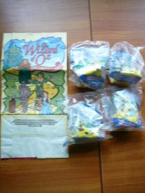Blockbuster WIzard of Oz bag with all 4 toy figures from 1998. Sold 3/31/13 - $20.0000