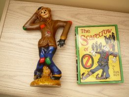 Scarecrow -  Wizard of Oz figurine. 13 1/2" SCARECROW is in good condition with no cracks. - $75.0000