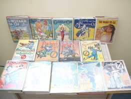 Complete set of 14 Frank Baum Oz books in dust jackets. post 1935 printing. - $1200.0000
