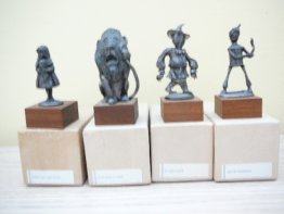 4 Wizard of Oz figurines - Collectible