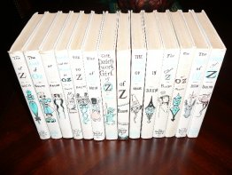 Complete set of 14 Frank Baum Oz books. White cover edition. Printed circa 1965. Sold 11/9/2013 - $600.0000