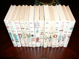 Complete set of 14 Frank Baum Oz books. White cover edition. Printed circa 1965. Sold 12/12/2013 - $500.0000