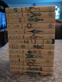 Complete set of 14 Frank Baum Oz books. White cover edition. Printed circa 1965. Sold 12/11/2013 - $700.0000