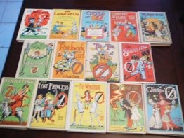 Complete set of 14 Frank Baum Oz books. White cover edition. Printed circa 1965. Sold 8/28/2014 - $700.0000