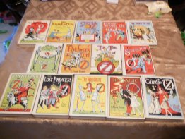 Complete set of 14 Frank Baum Oz books. White cover edition. Printed circa 1965. Sold 1/4/2016