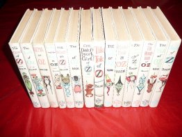 Complete set of 14 Frank Baum Oz books. White cover edition. Printed circa 1965.