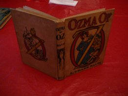 Ozma of Oz, 1-edition, 1st state, primary binding. ~ 1907.