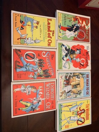 Set of 7 Frank Baum Oz books. White cover edition. Printed circa 1965