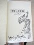 Wicked by Gregory Maguire. 1st edition, 1st printing. Signed & sketched by Gregory Maguire in original dust jacket-22.Sold 1/18/2013 - $900.0000
